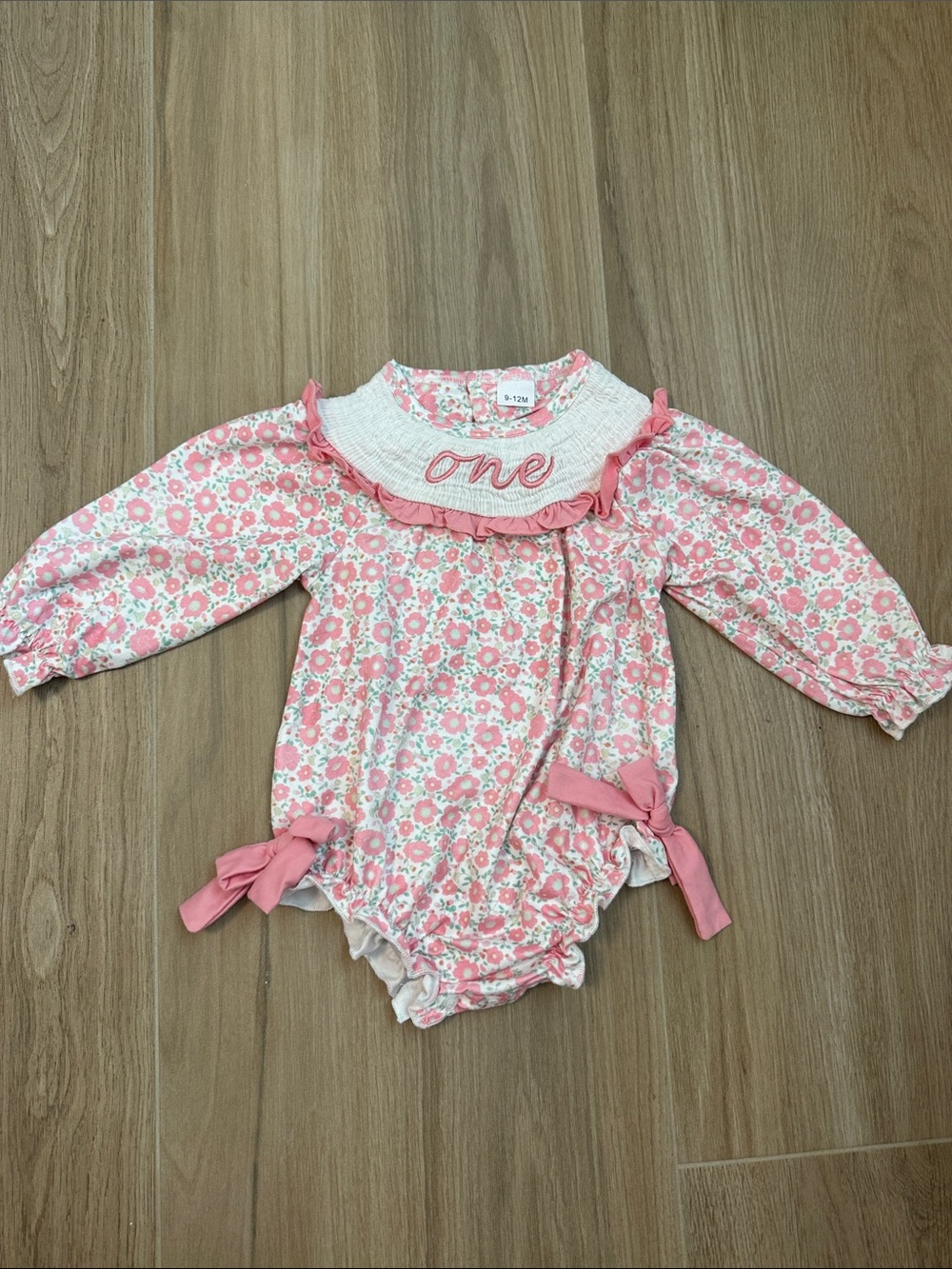 Pink Floral 'One' Smocked Baby One-Piece